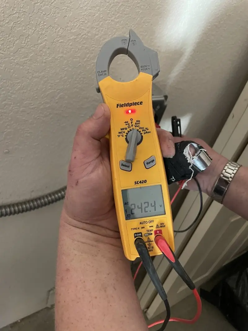 Voltage testing with clamp meter during Hot Tub / Pool Electrical Wiring in Sunbury
